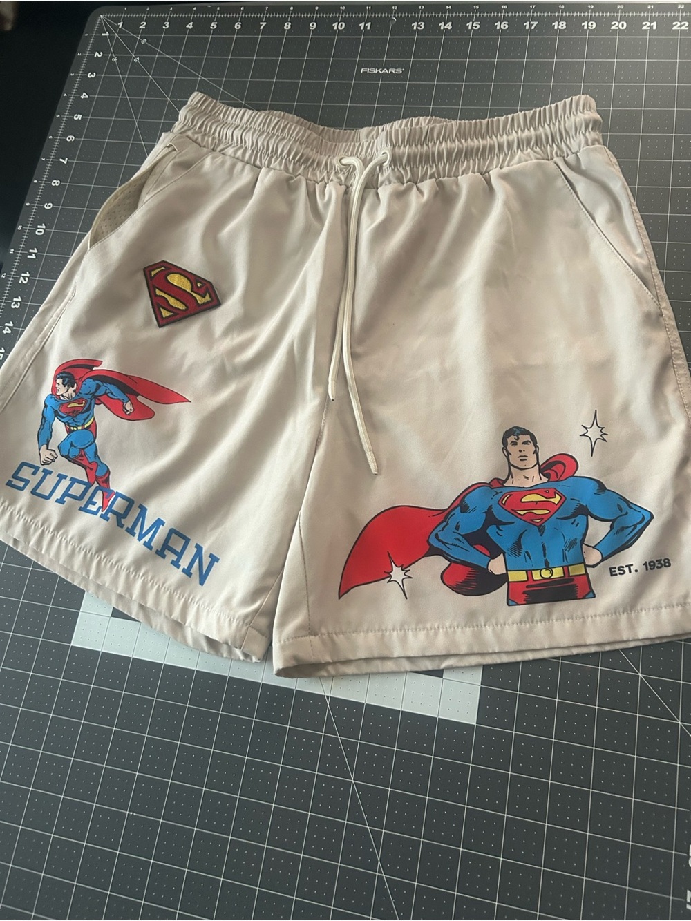 DC Beige Superman Graphic Men’s Athletic Shorts with Red and Blue Details